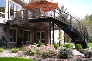 Inspiration for a timeless backyard deck remodel in Minneapolis with no cover