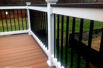 Example of a transitional backyard deck design in Baltimore