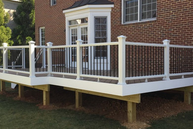 Deck - large traditional backyard deck idea in DC Metro with no cover