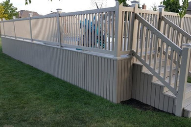 Inspiration for a large modern backyard dock remodel in Chicago with no cover