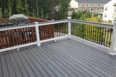 Mid-sized elegant backyard deck photo in Baltimore with no cover