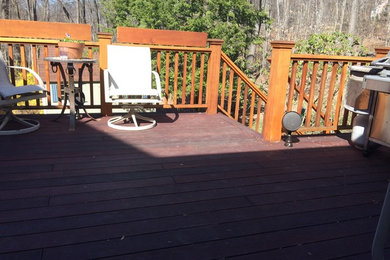 Large elegant backyard deck photo in New York with no cover
