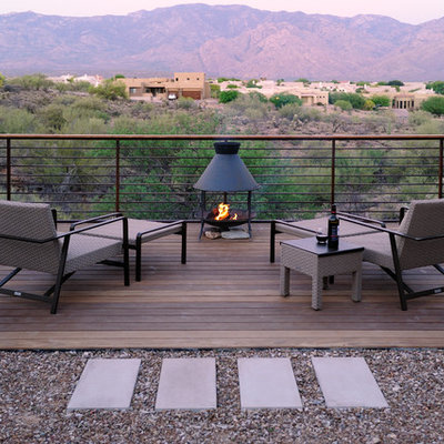 Example of a trendy deck design in Phoenix with a fire pit