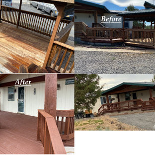 Example of a large southwest courtyard deck container garden design in Other with a roof extension