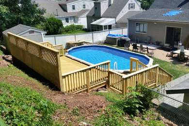 Deck - mid-sized traditional backyard deck idea in New York with no cover