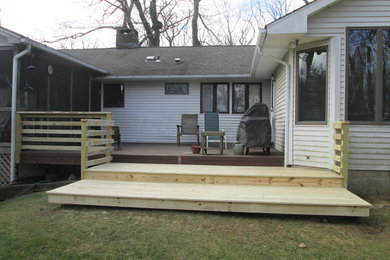 Deck - small country backyard deck idea in New York