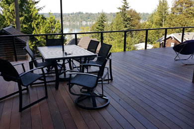 Mid-sized trendy deck photo in Seattle