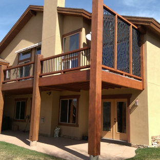 Idee per una privacy sulla terrazza design di medie dimensioni e dietro casa