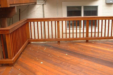 Inspiration for a mid-sized backyard deck remodel in DC Metro with no cover