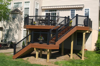 Deck - craftsman backyard deck idea in Philadelphia with an awning