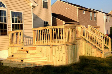 Deck - mid-sized backyard deck idea in Cleveland