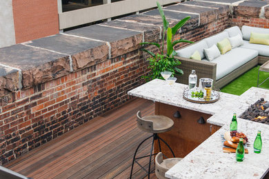 Inspiration for a mid-sized modern rooftop rooftop deck remodel in Denver with a fire pit