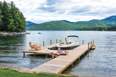 Dock - rustic backyard dock idea in Other with no cover