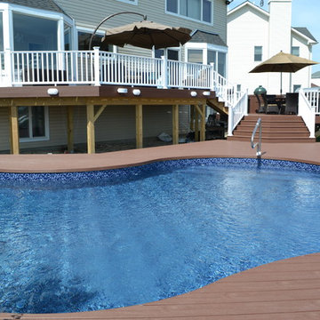 : Elegant Multi-Level Deck and Freeform Pool: In order to bring the outdoor  spa