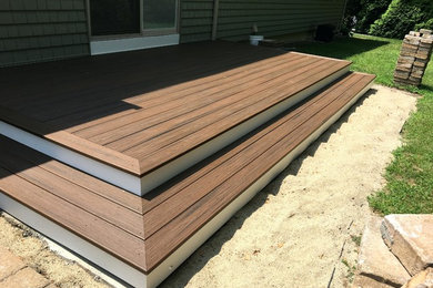 Inspiration for a mid-sized contemporary backyard deck remodel in Charlotte with no cover