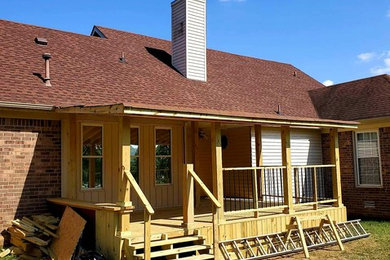 Inspiration for a timeless deck remodel in Nashville with a roof extension