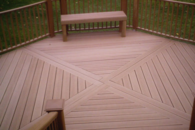 Inspiration for a backyard deck remodel in Grand Rapids with no cover