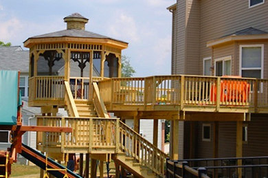 Deck - large backyard deck idea in Cleveland