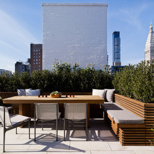 Exemple d'un toit terrasse sur le toit tendance avec aucune couverture.