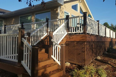 Inspiration for a large timeless backyard deck remodel in Wichita with no cover