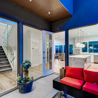 Inspiration for a mid-sized contemporary courtyard deck container garden remodel in Calgary with no cover