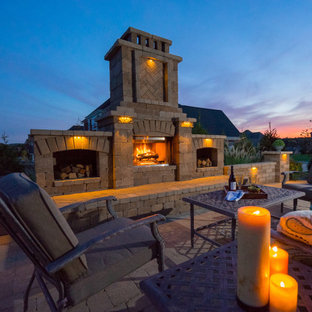Large mountain style courtyard deck photo in Other with a fireplace and no cover