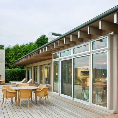 Inspiration for a contemporary deck remodel in Seattle with a fire pit