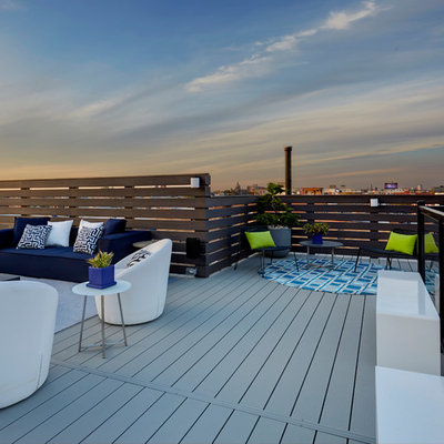 Deck container garden - large contemporary rooftop deck container garden idea in Chicago with no cover