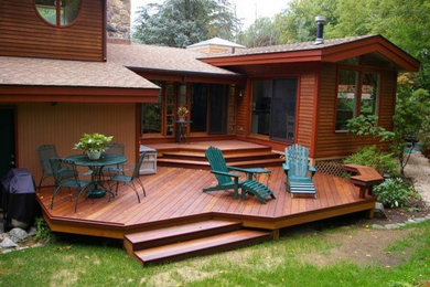 Inspiration for a mid-sized contemporary backyard deck remodel in New York