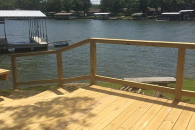 Example of an arts and crafts deck design in Kansas City