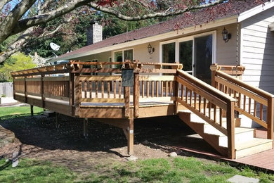 Example of an arts and crafts deck design in Seattle