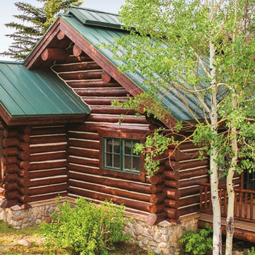Log, Metal and Stone Cabin Exterior