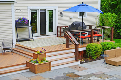 Deck - huge contemporary backyard deck idea in Boston