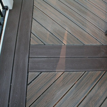 Low-maintenance Trex Transcend deck with aluminum handrail