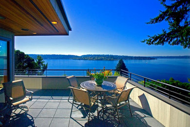 Example of an arts and crafts deck design in Seattle