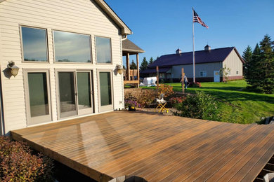 Mid-sized trendy backyard deck photo in Minneapolis