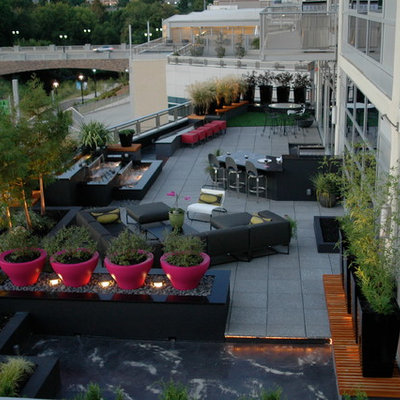 Deck container garden - large contemporary rooftop deck container garden idea in Charlotte with no cover