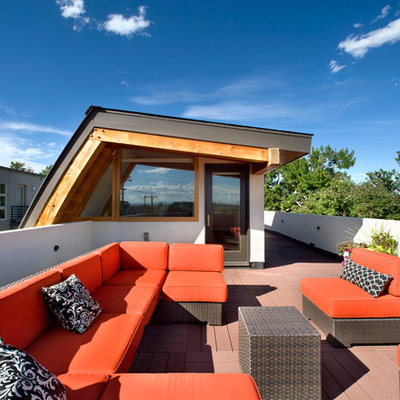 Example of a mid-sized trendy rooftop rooftop deck design in Denver with no cover