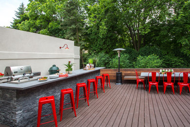 Example of a small trendy backyard deck design in Other with no cover