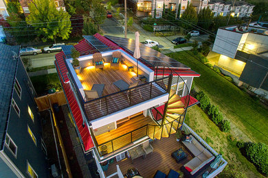 Inspiration for a contemporary rooftop deck remodel in Seattle with no cover