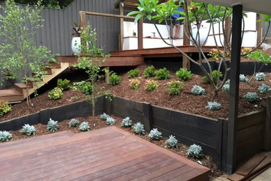 Example of a mountain style backyard deck design in Brisbane