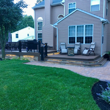 Multi level Trex deck with a patio and fire pit