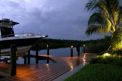 Example of a large transitional backyard dock design in Orange County with no cover