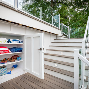 Example of a large beach style backyard deck design in Chicago