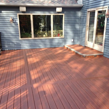 New Vinyl Siding, Soffit, Fascia & TimberTech Composite Deck with LED Lighting
