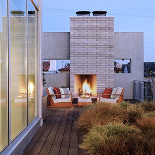 Foto de terraza moderna, grande, sin cubierta, en azotea, con brasero
