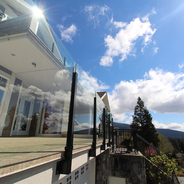 North Vancouver Duradek Vinyl Rooftop Deck With Panorama Glass Railings