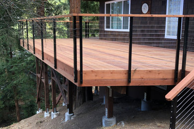 Inspiration for a rustic cable railing deck remodel in San Francisco