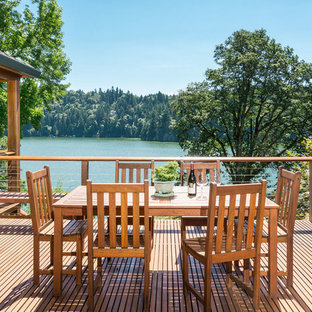 Example of a mountain style deck design in Portland with no cover