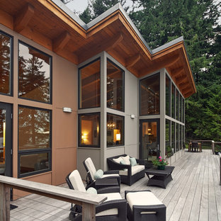 Mid-sized mountain style backyard deck photo in Seattle with no cover